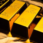 Gold bars on shiny yellow background.