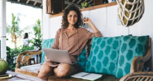 pretty digital nomad with netbook