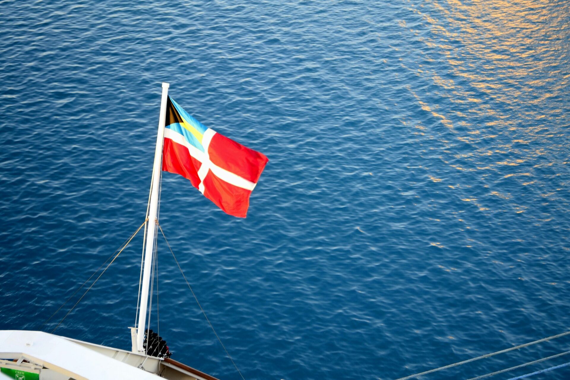 Civil Ensign of the Bahamas on the back of a ship.