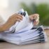 Business Documents, Auditor businesswoman checking searching document legal prepare paperwork or rep