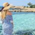 Woman at the beach in Cyprus. Beautiful Summer seaside view